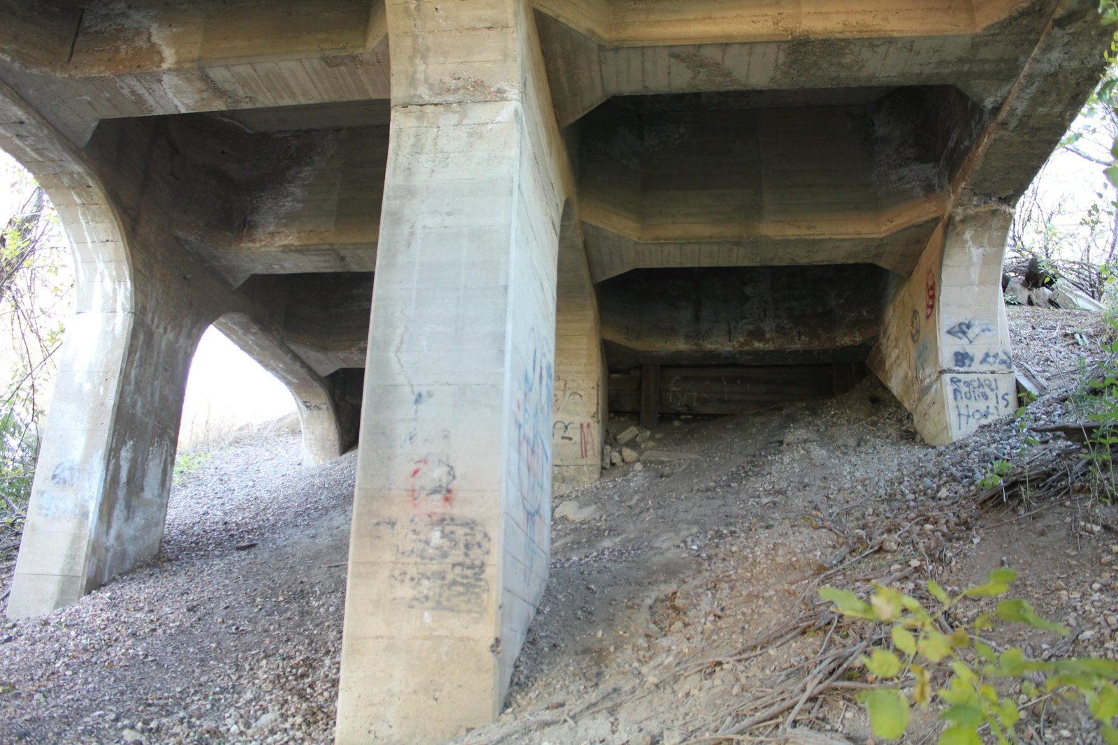 Under east approach and east abutment